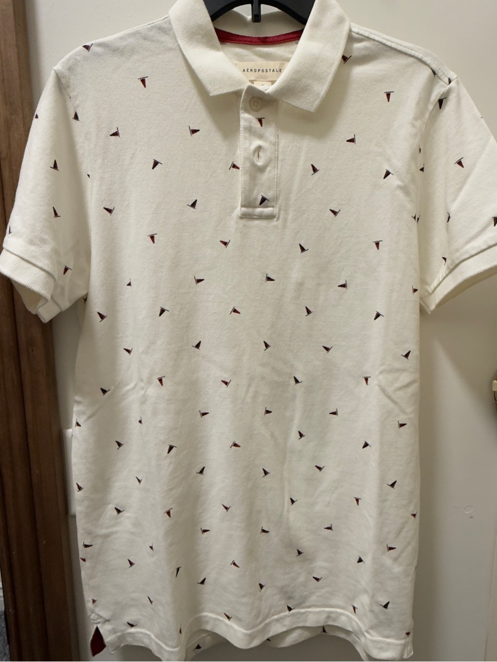 Aeropostale Men's Cream Polo with Tiny Red and Black Triangle Print